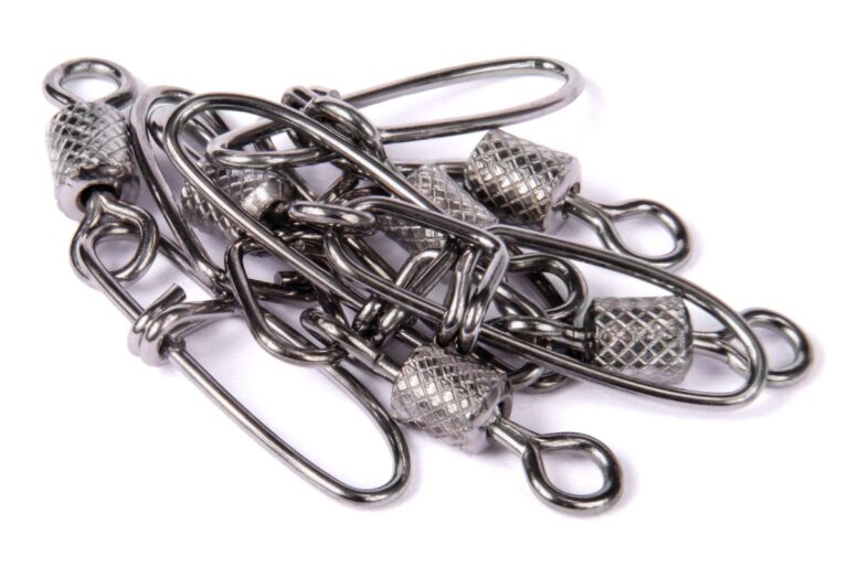 Swivels used for fishing in white background.