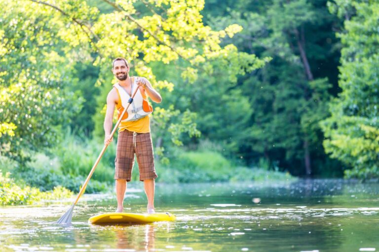A man on a Standup Paddle Board.