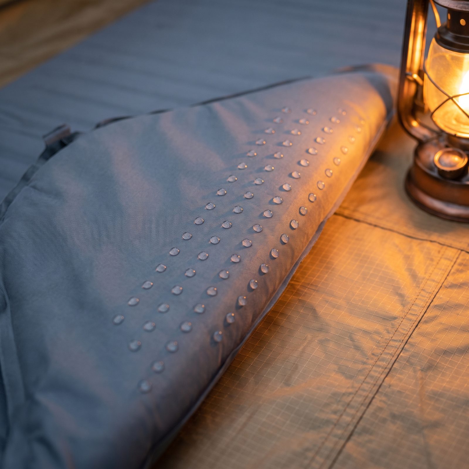 Add Cured Silicone Dots Beneath a Sleeping Pad to Stop Sliding