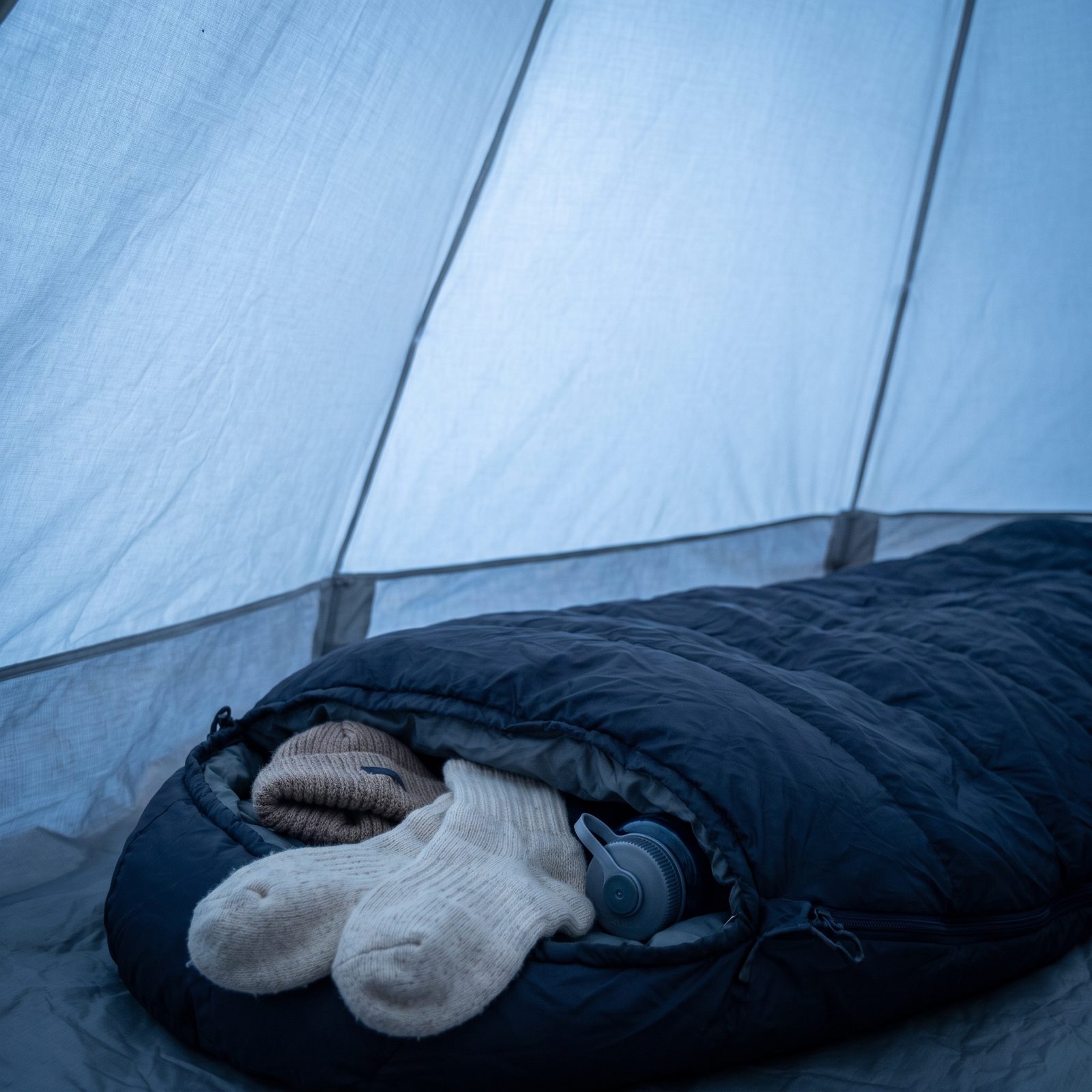 Put Tomorrow's Socks in Your Sleeping Bag to Warm and Dry Them