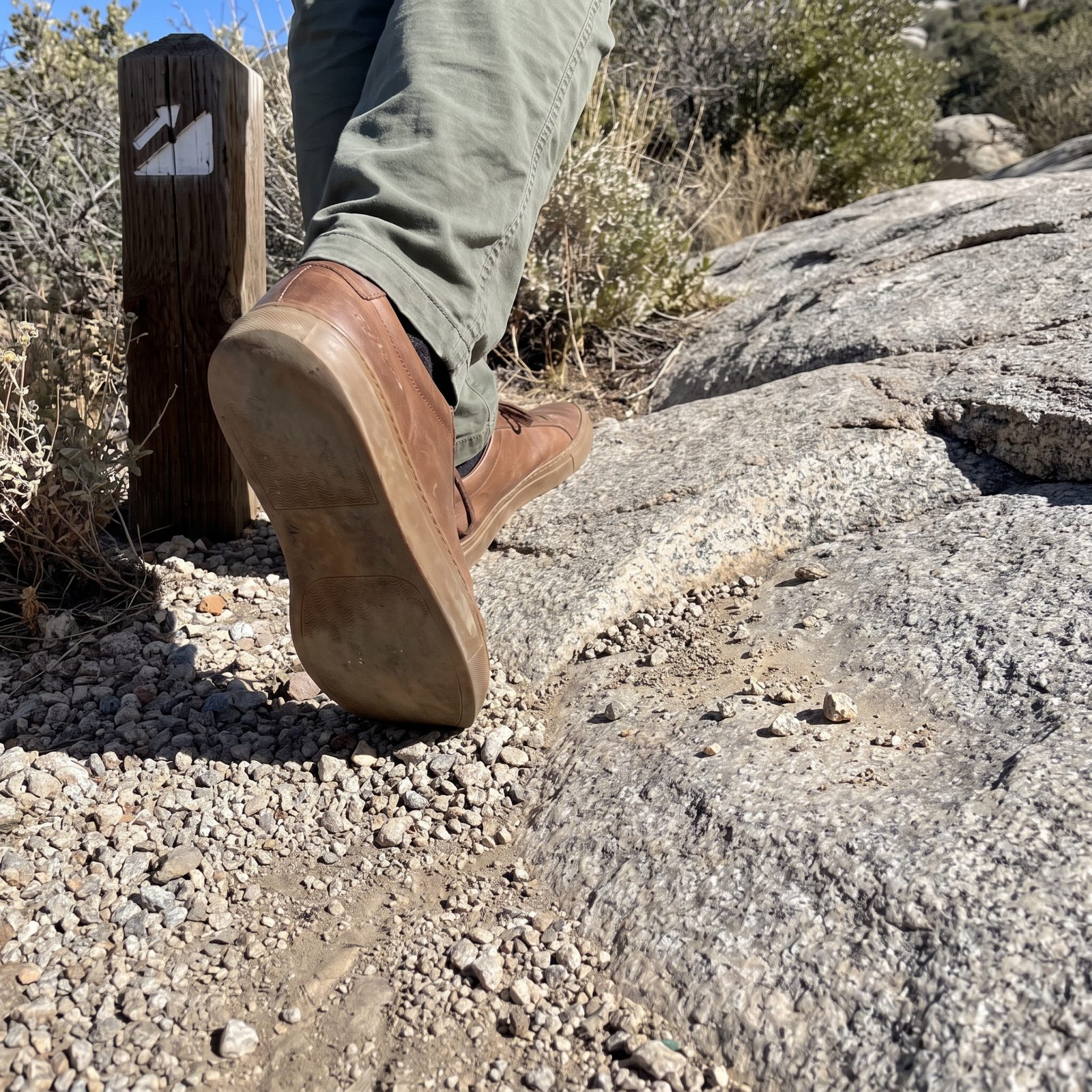 Smooth-Soled Shoes Appear at a Steep Trailhead