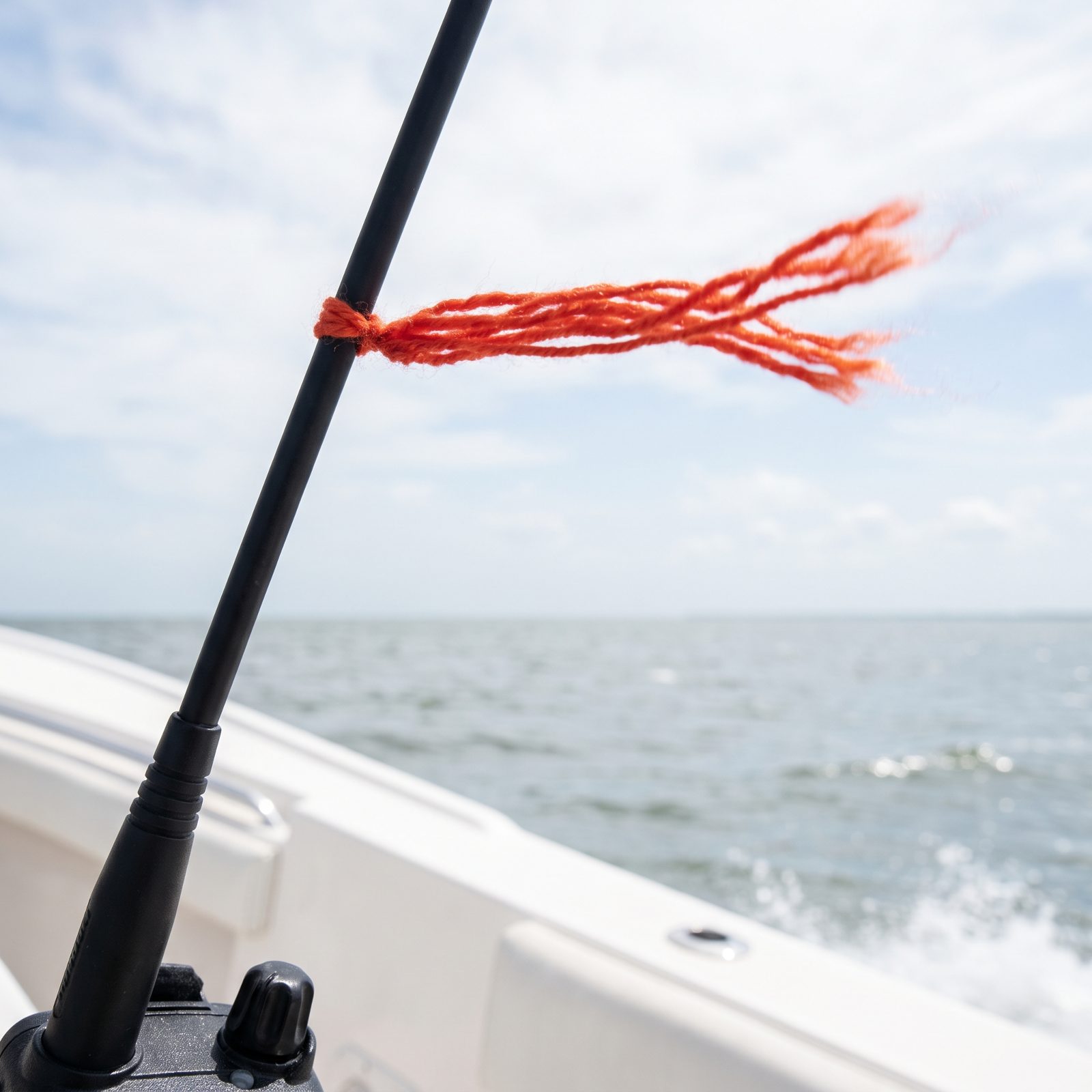 Tie a Short Yarn Telltale to the Antenna for an Instant Wind Read